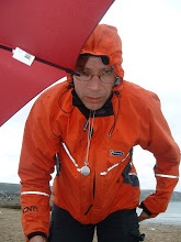 Georg Lentze hiding under an umbrella