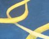Yellow swirling lines against a blue background
